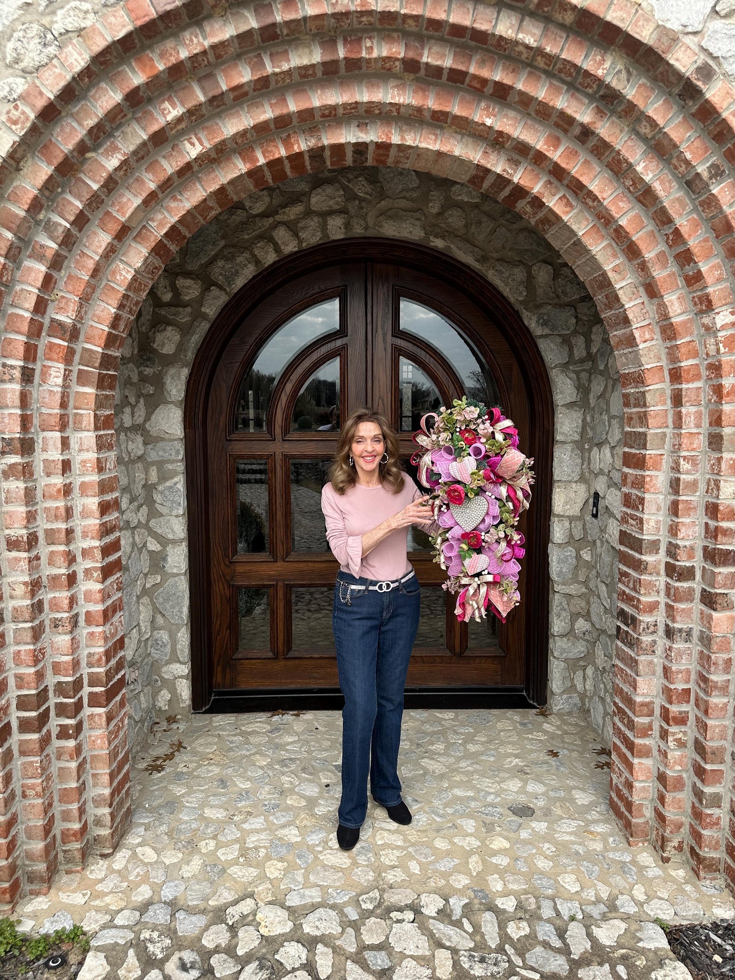 Elevate your home decor with this luxury pearl and rhinestone heart wreath accented with peonies and designer ribbons for your front door.