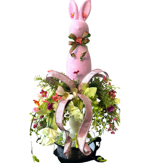 Elevate your Easter Home Decor with this enchanting Flocked Bunny Candlestick Centerpiece on a  surrounded by Ribbon and Wispy Flowers.