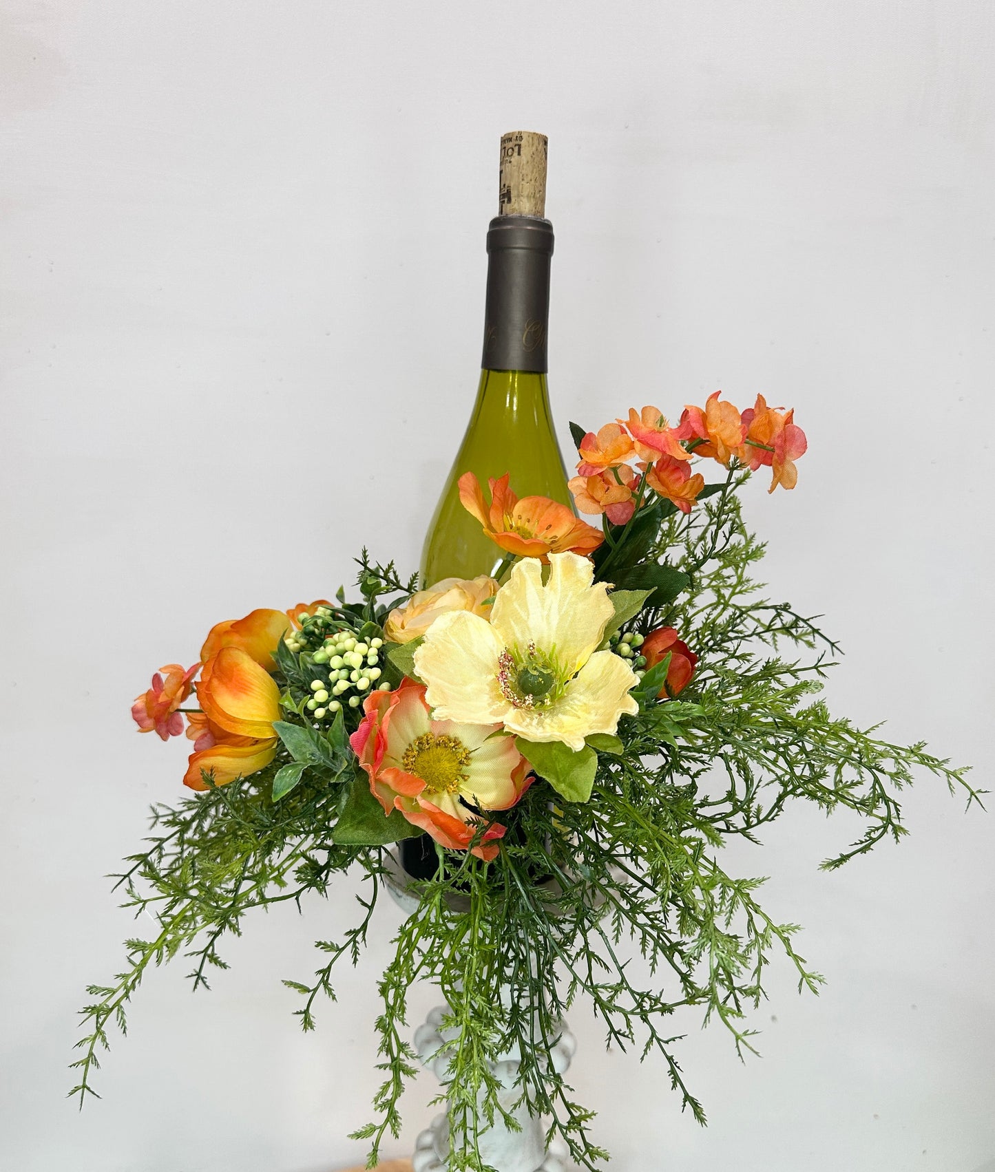 Environmentally friendly floral wine bottle bouquet for hostess gift, friend gift, housewarming, party idea or wine accessory.