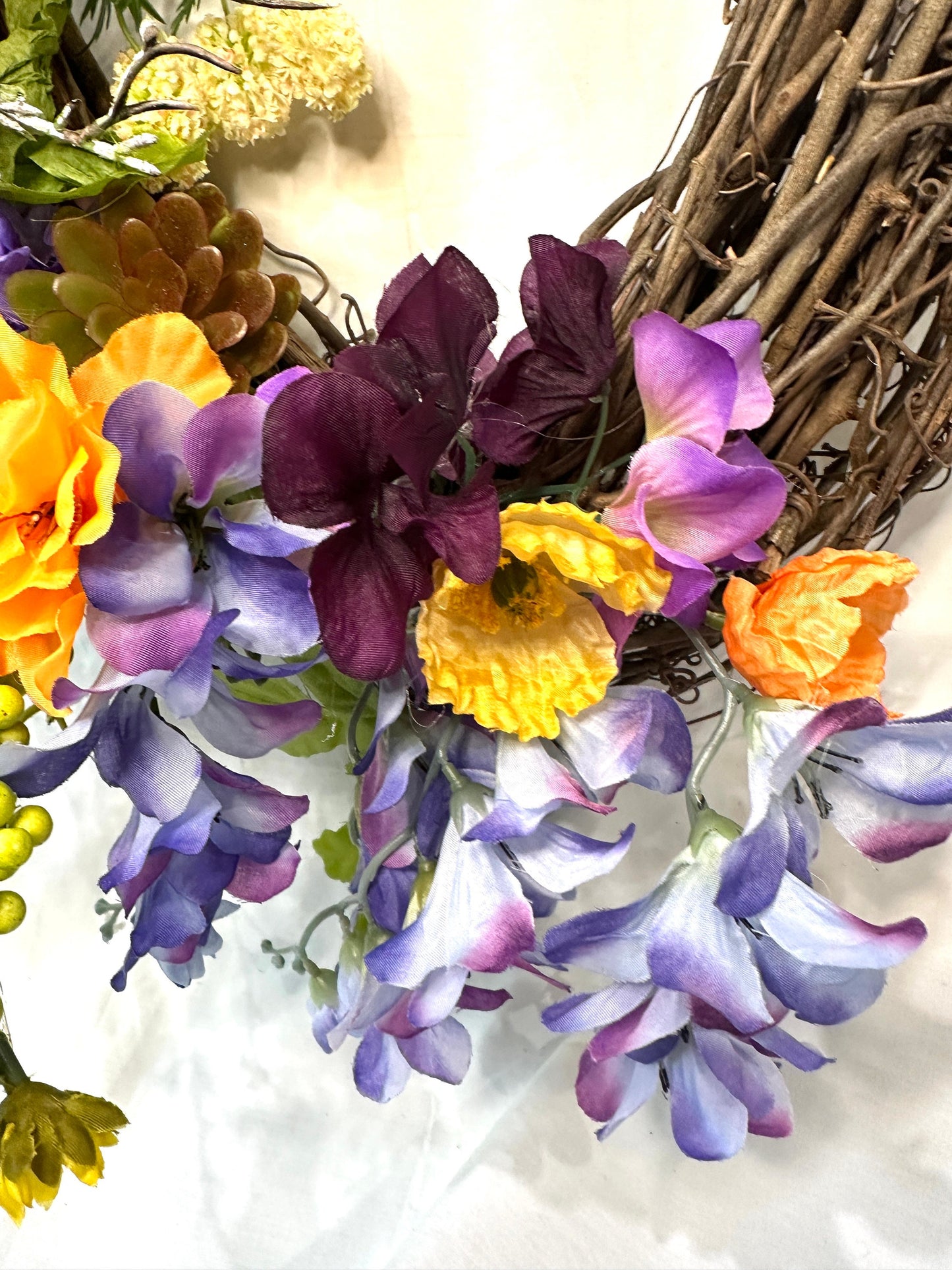 Multicolored Oval Grapevine Everyday Wreath with Multicolored bow and Spring or Summer Flowers