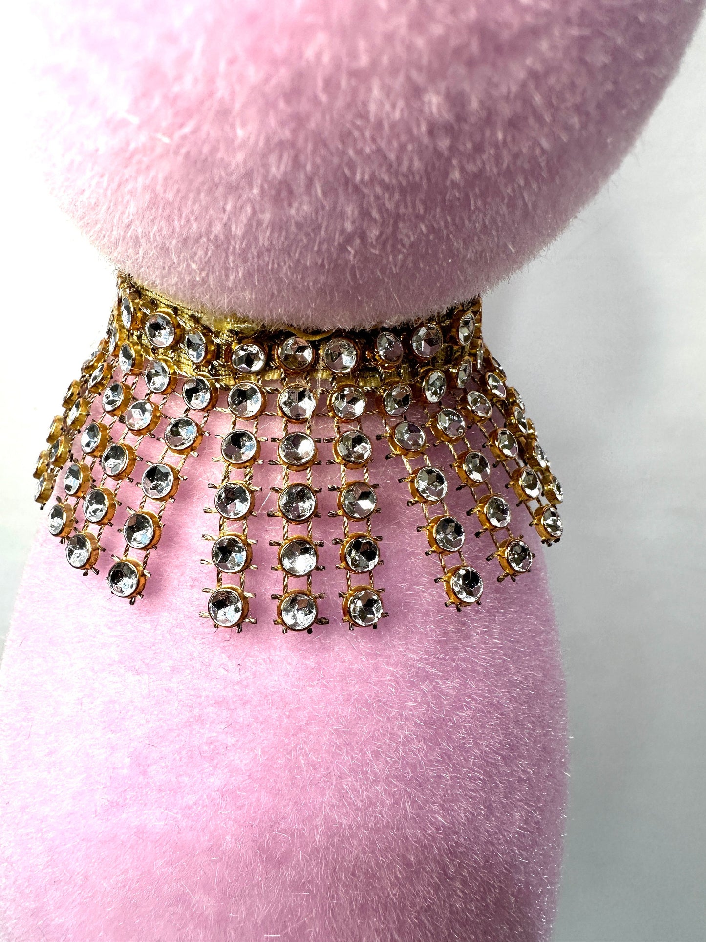 Welcome spring with this charming flocked pink 16" Easter bunny with a rhinestone necklace and earrings. Perfect for Easter your decor.