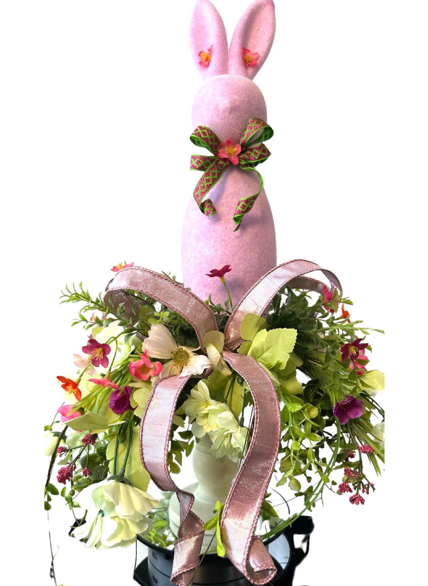 Elevate your Easter Home Decor with this enchanting Flocked Bunny Candlestick Centerpiece on a surrounded by Ribbon and Wispy Flowers.