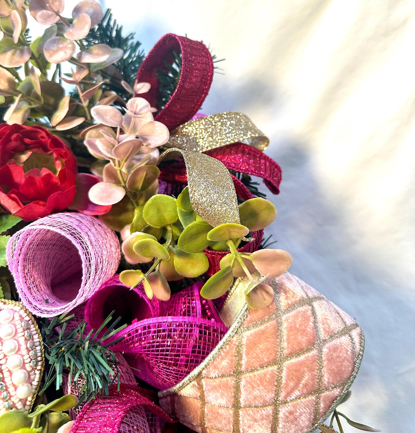 Elevate your home decor with this luxury pearl and rhinestone heart wreath accented with peonies and designer ribbons for your front door.