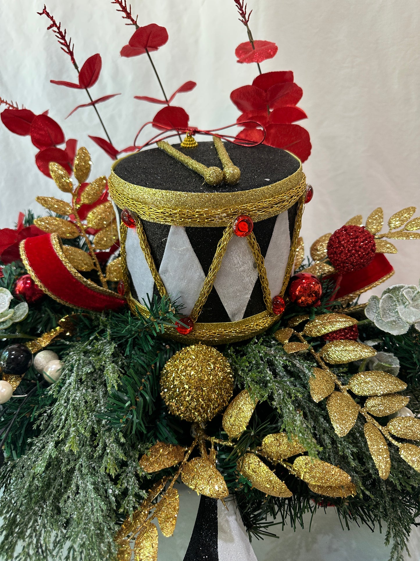 3 piece traditional nutcracker christmas mantle decor with designer harlequin ribbon, nutcracker hat, christmas ornaments, velvet ribbon and drums. (Copy) (Copy)