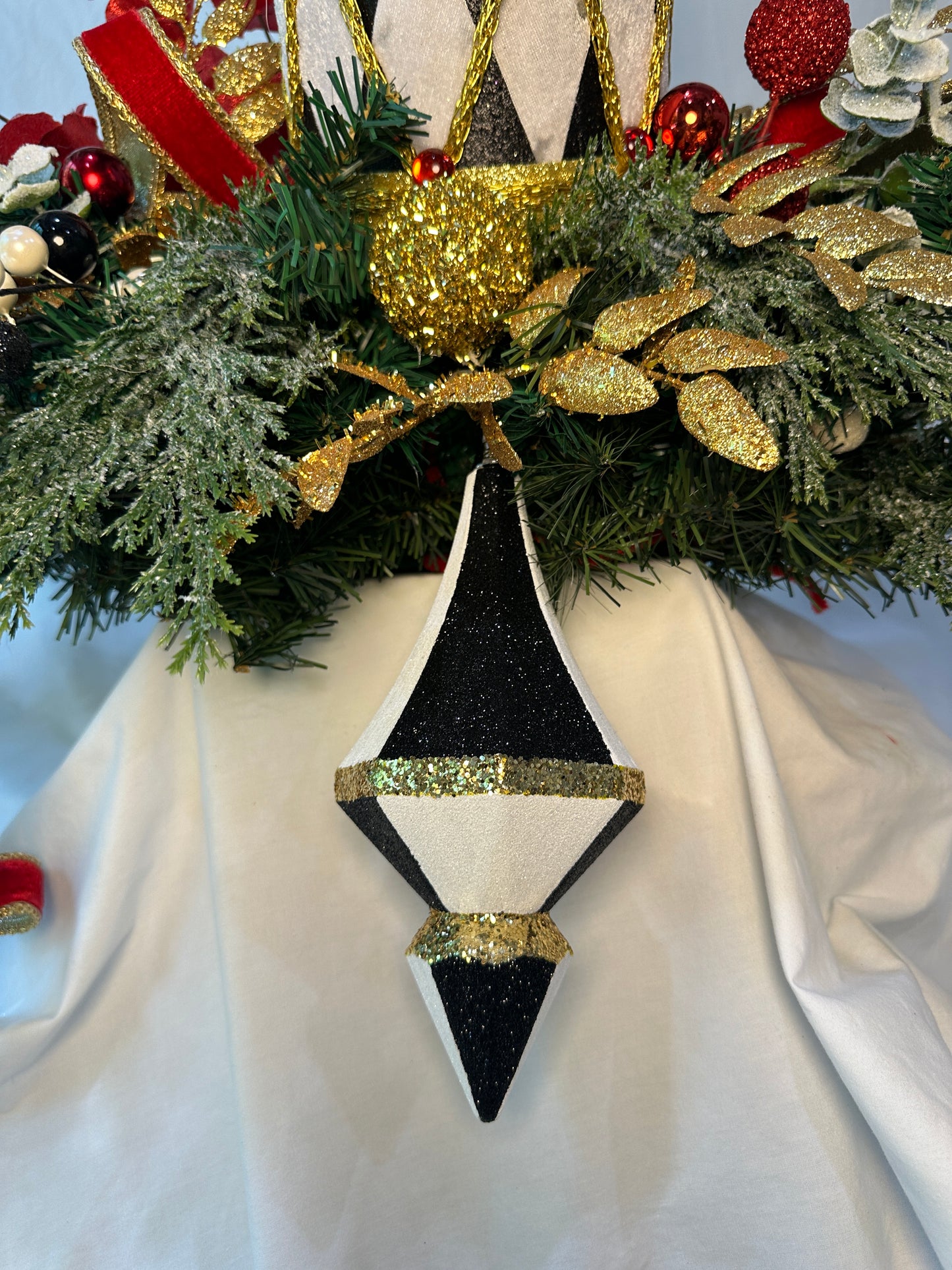 3 piece traditional nutcracker christmas mantle decor with designer harlequin ribbon, nutcracker hat, christmas ornaments, velvet ribbon and drums. (Copy) (Copy)