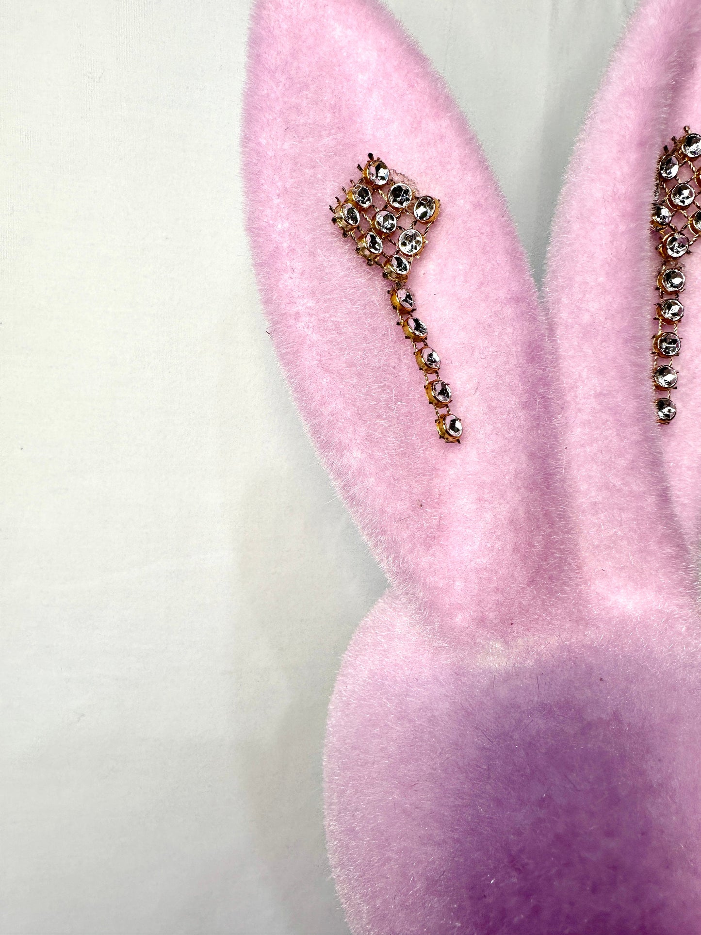Welcome spring with this charming flocked pink 16" Easter bunny with a rhinestone necklace and earrings. Perfect for Easter your decor.