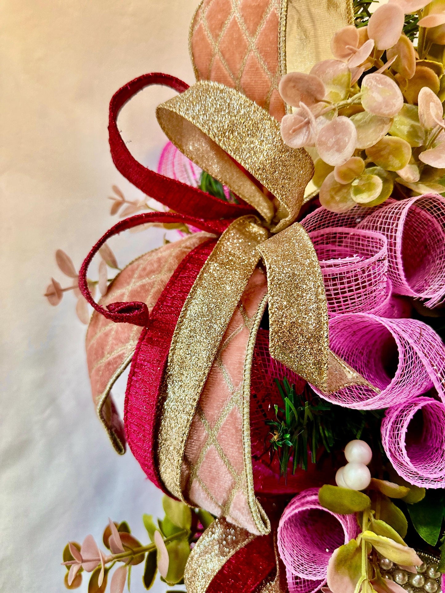 Elevate your home decor with this luxury pearl and rhinestone heart wreath accented with peonies and designer ribbons for your front door.