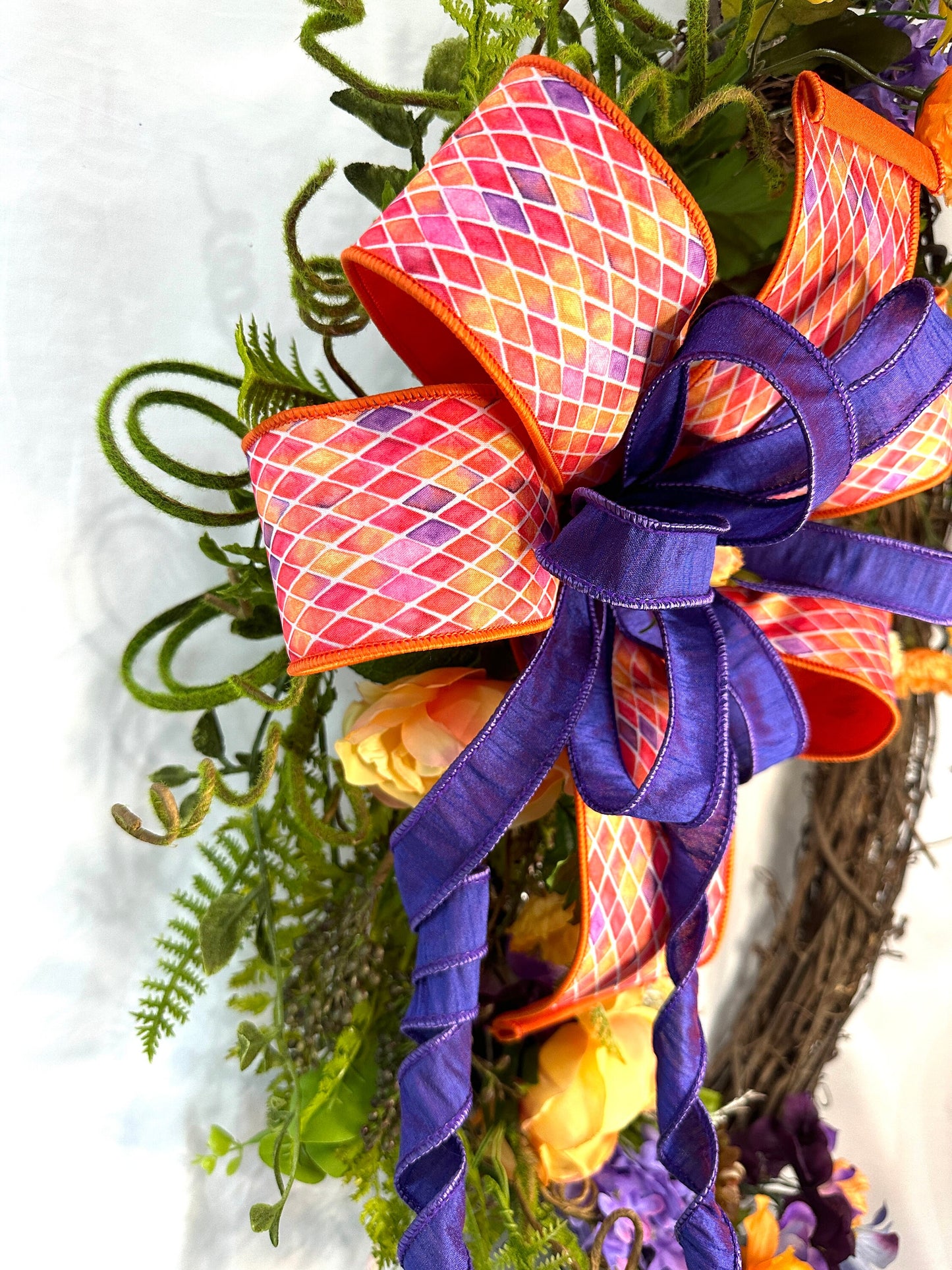 Multicolored Oval Grapevine Everyday Wreath with Multicolored bow and Spring or Summer Flowers