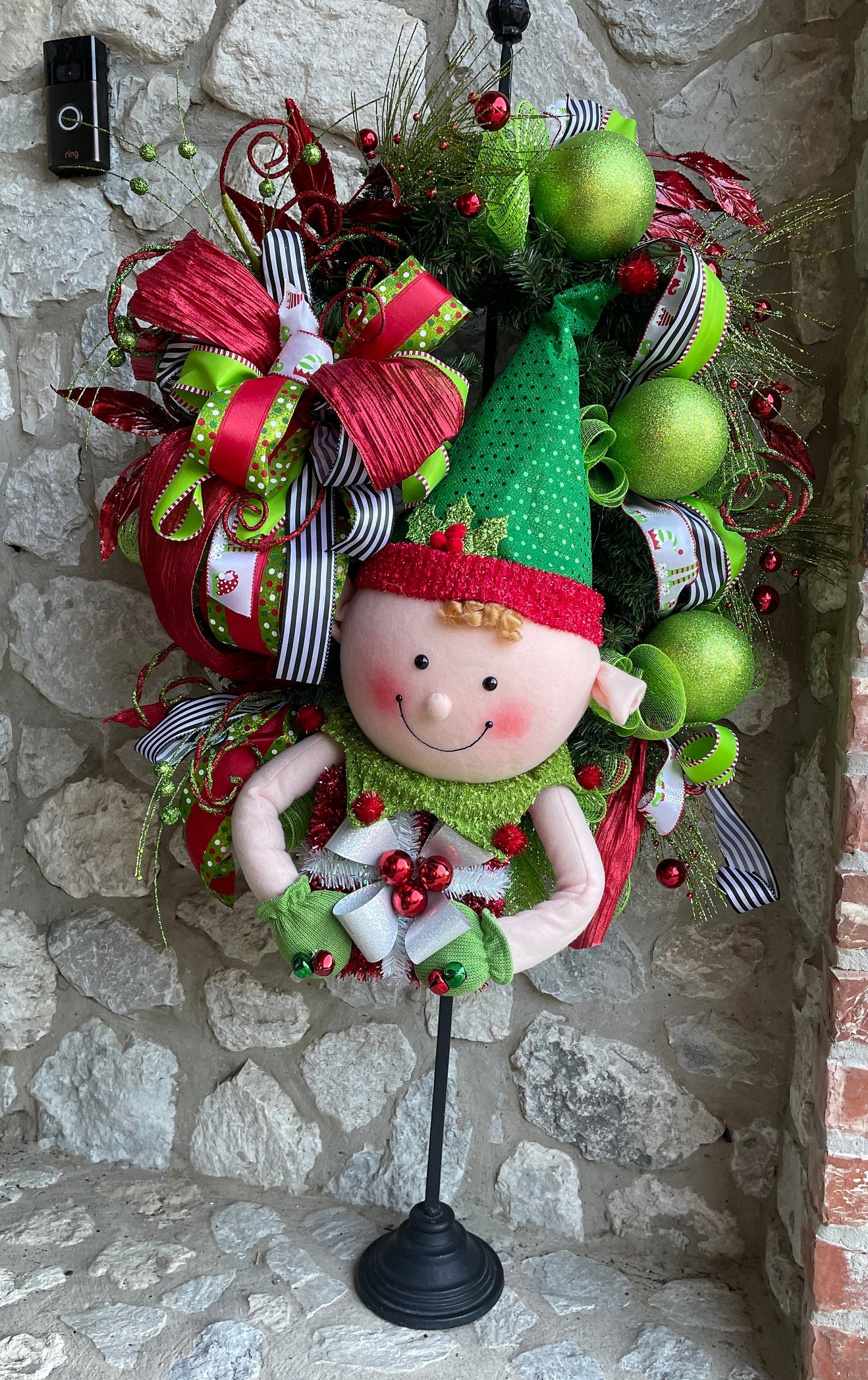 Whimsical Christmas elf in traditional colors is a perfect front door or porch winter wreath, child's room accessory or holiday gift.