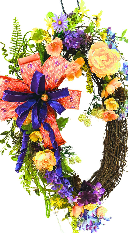 Multicolored Oval Grapevine Everyday Wreath with Multicolored bow and Spring or Summer Flowers