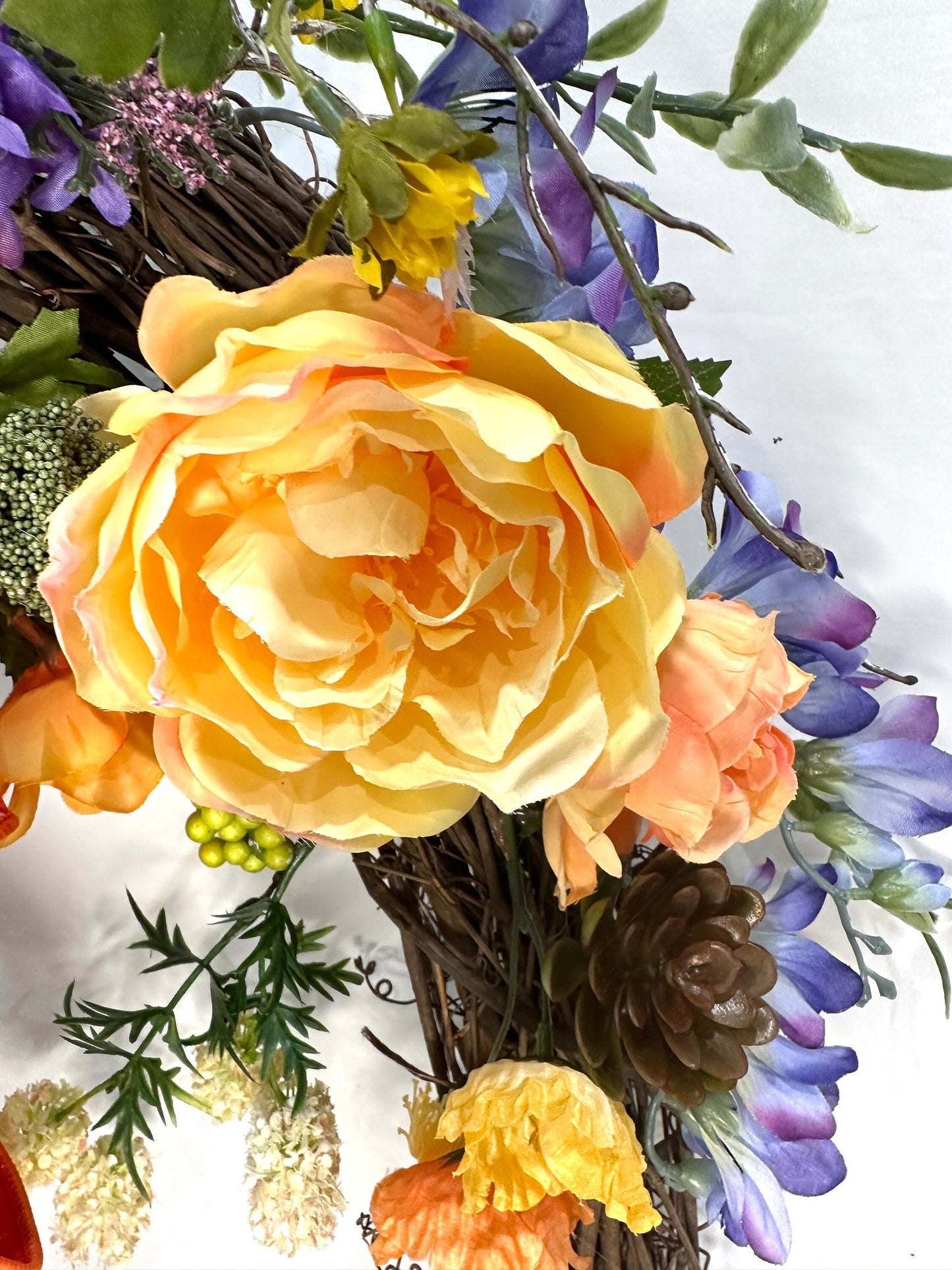 Multicolored Oval Grapevine Everyday Wreath with Multicolored bow and Spring or Summer Flowers