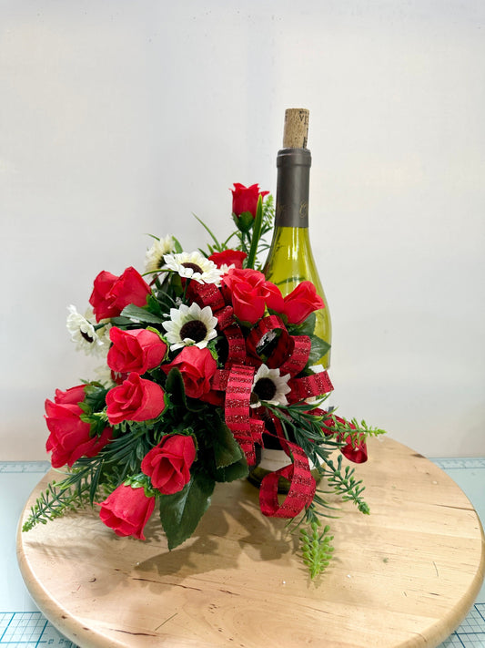 Floral wine bottle bouquet for an environmentally friendly hostess gift, housewarming, party idea, Christmas gift or wine accessory.