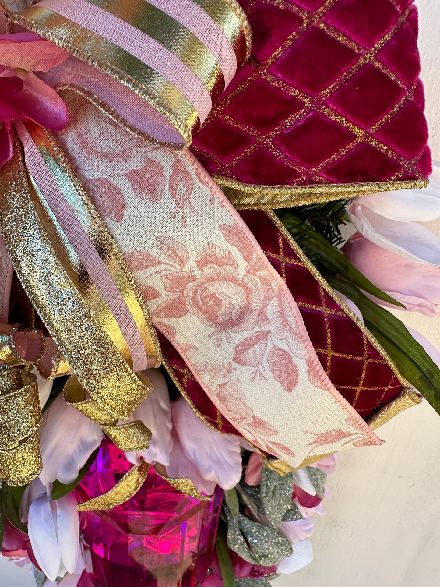 Elevate your home decor with this luxury pearl and rhinestone heart wreath accented with peonies and designer ribbons for your front door.