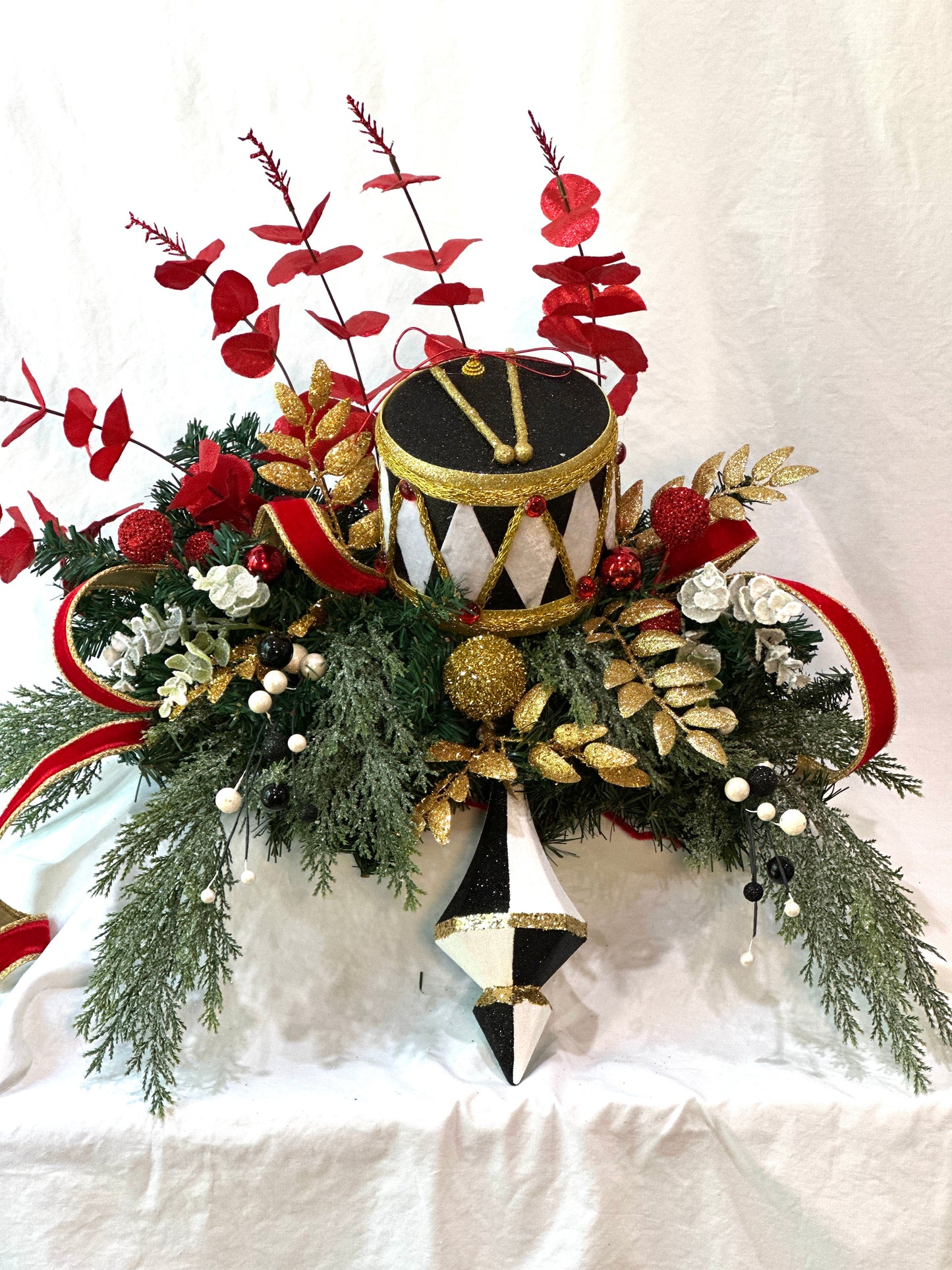 3 piece traditional nutcracker christmas mantle decor with designer harlequin ribbon, nutcracker hat, christmas ornaments, velvet ribbon and drums. (Copy) (Copy)