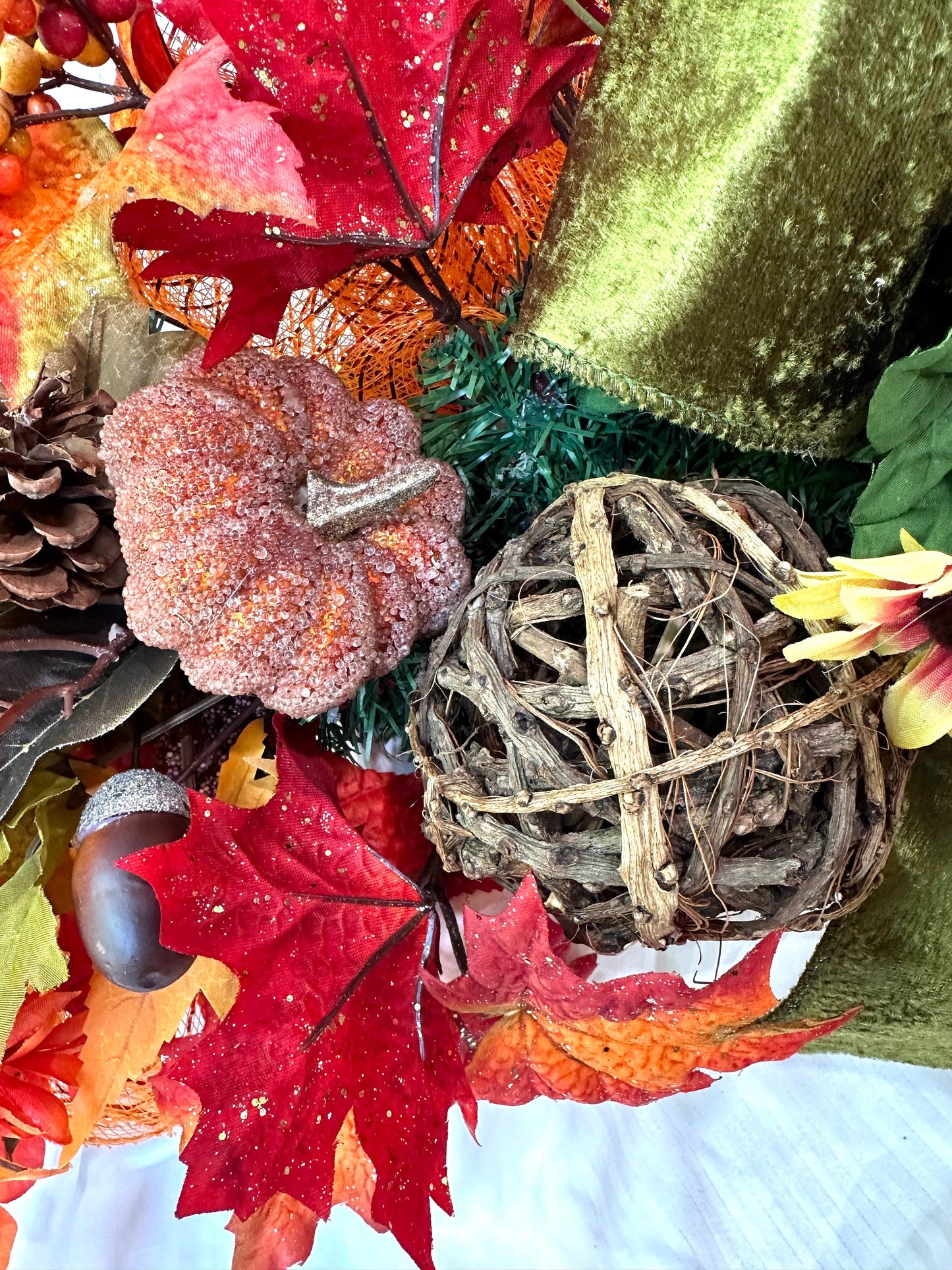 Welcome the beauty of Autumn into your home with our Harvest or Fall centerpiece with twig balls, natural elements, acorns and pumpkins.