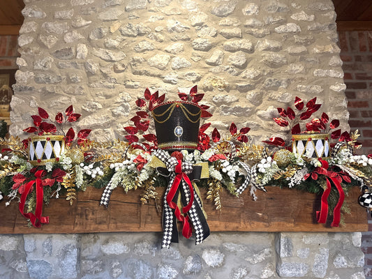 Sandye 3 piece traditional nutcracker christmas mantle decor with designer harlequin ribbon, nutcracker hat, christmas ornaments, velvet ribbon and drums.