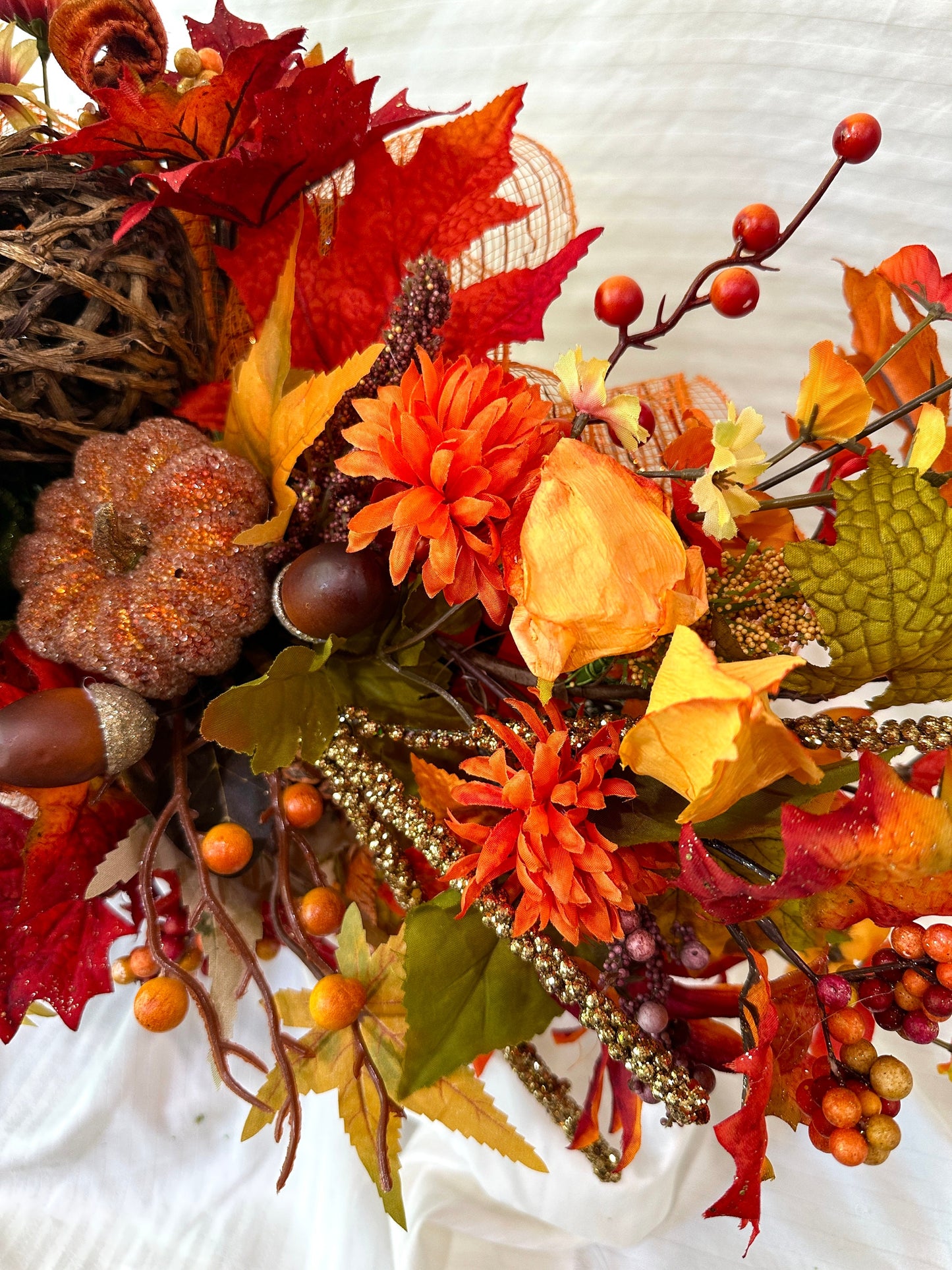 Welcome the beauty of Autumn into your home with our Harvest or Fall centerpiece with twig balls, natural elements, acorns and pumpkins.